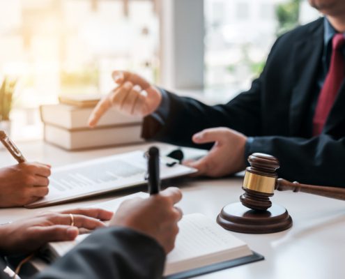 Insight Legal Solutions: lawyers signing a will